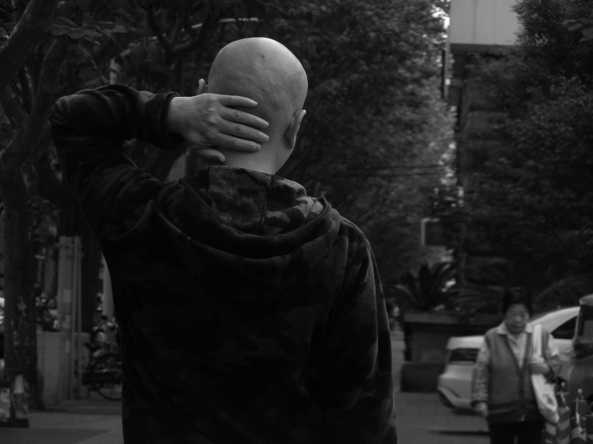 grayscale photo of man in black jacket