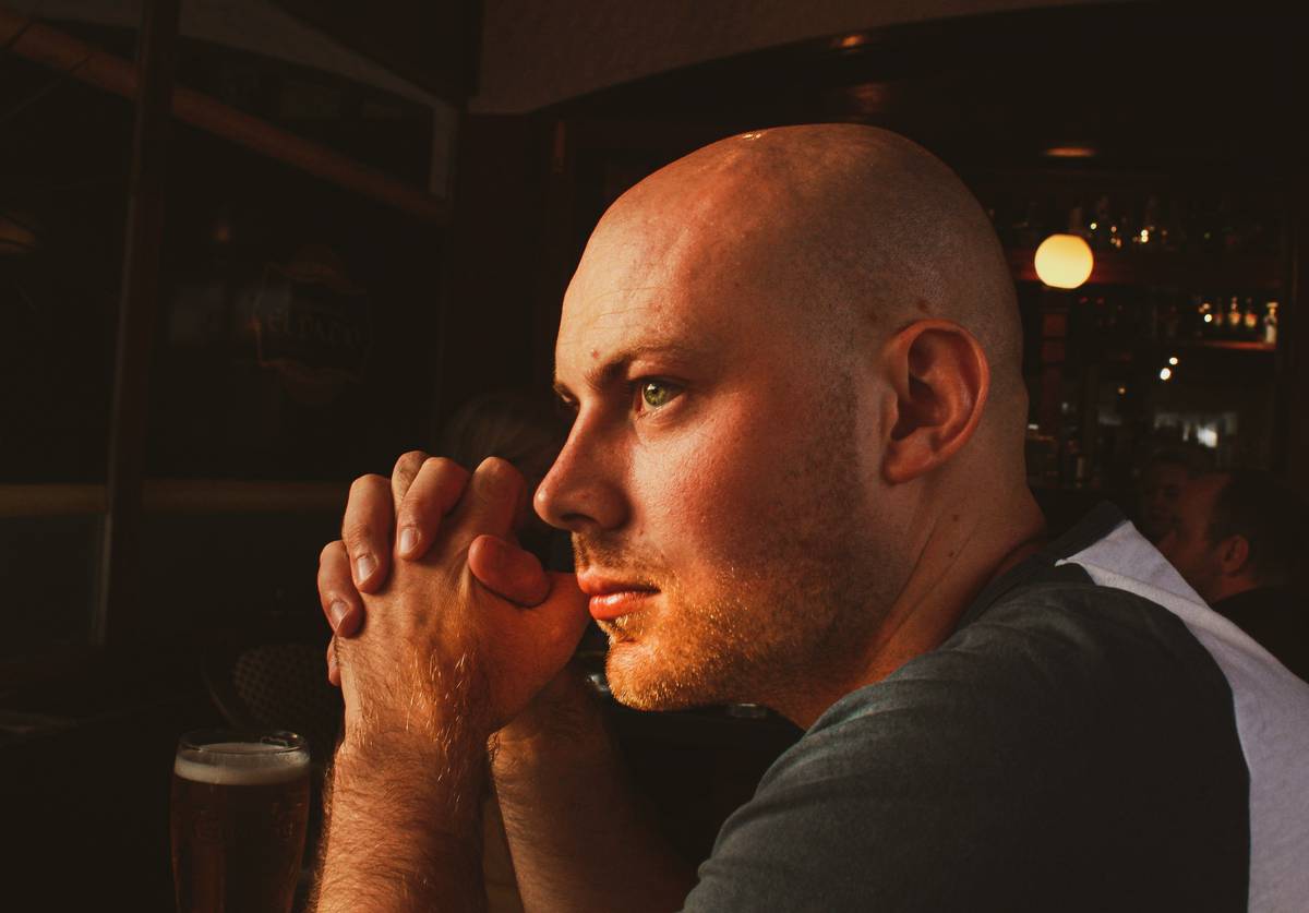 man in white and black shirt