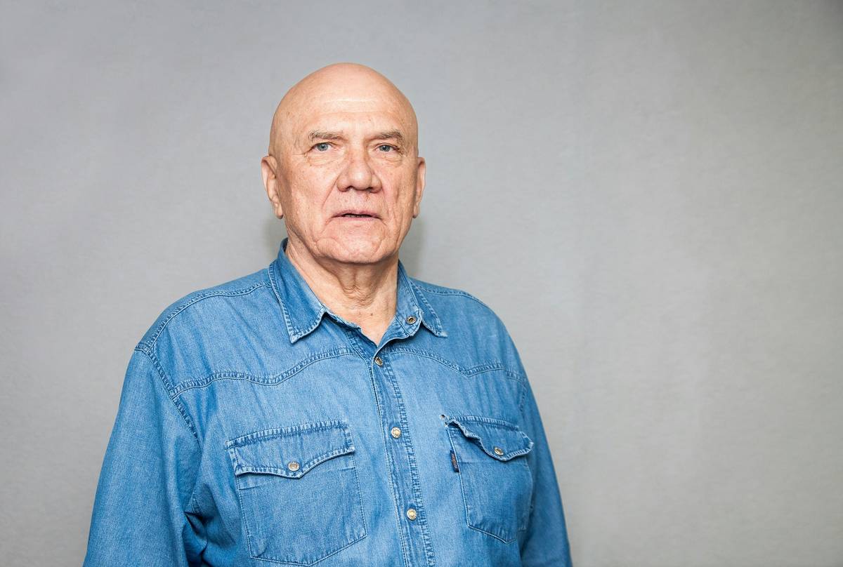 a man in a blue shirt