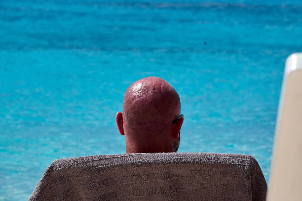 close-up of smooth bald head after proper shave - how to shave your head