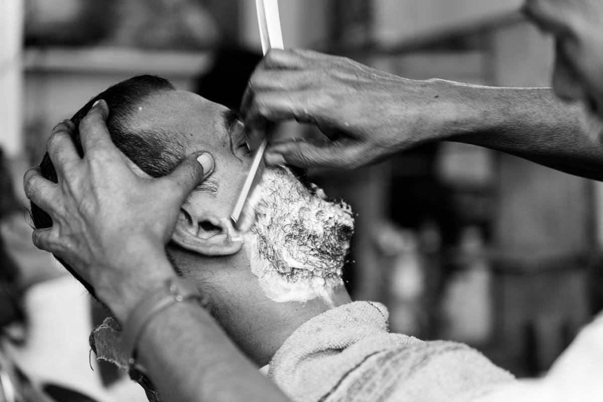 Comparison of products used in bald head care for men showing sunscreen and moisturizer