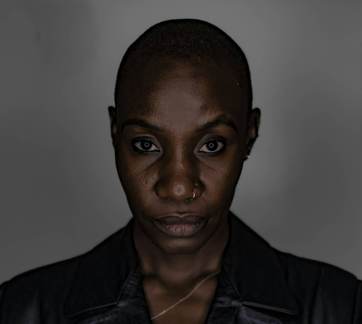 Black woman with a shaved head